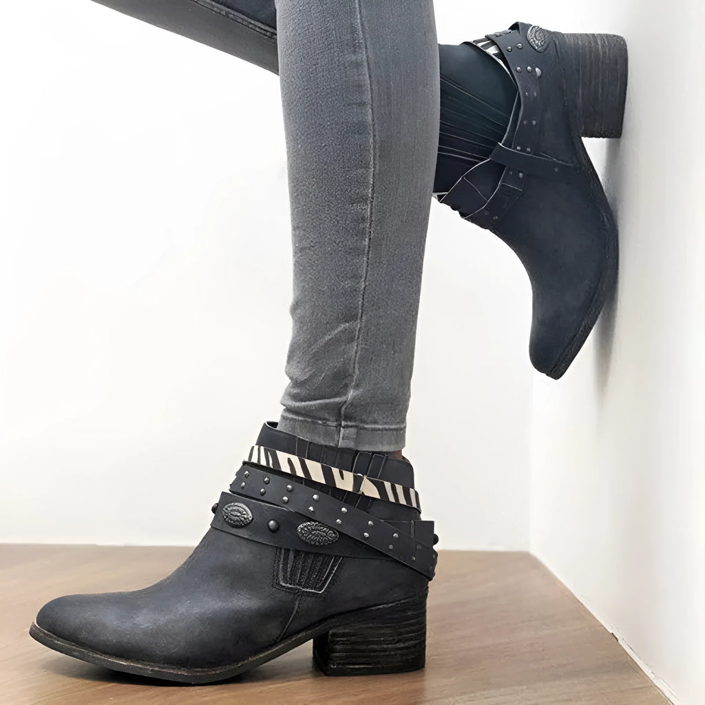Vintage women's black high heel shoes with tassel detail and back-tie fastening