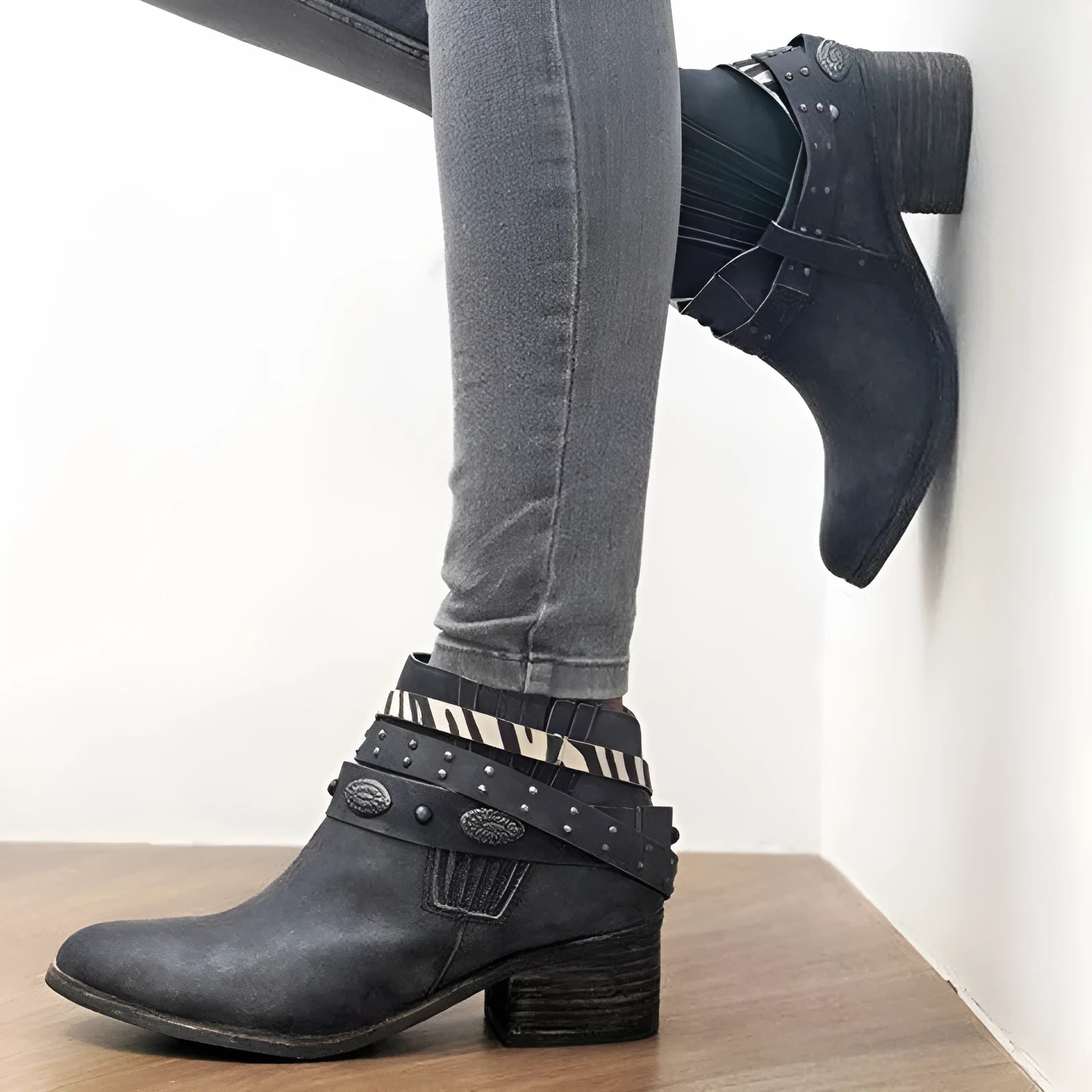 Vintage women's black high heel shoes with tassel detail and back-tie fastening