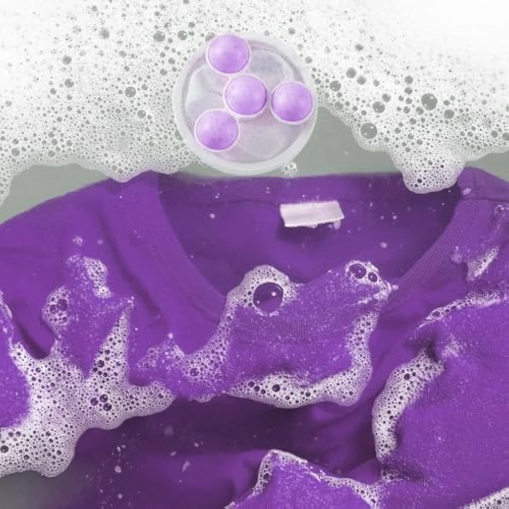 Set of three reusable pink blue and purple washing machine hair filter bags for pet lint removal.