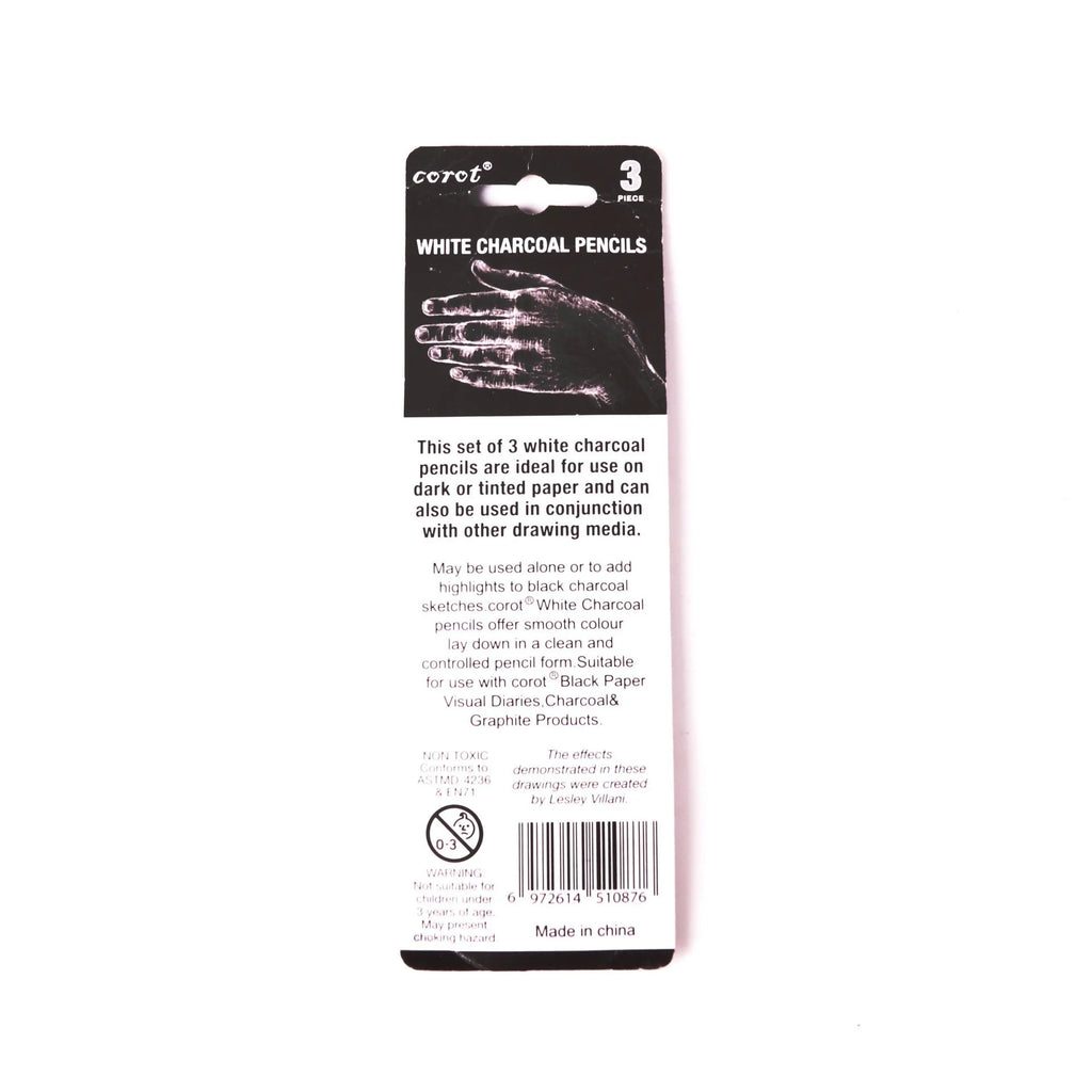 Set of three white charcoal sketching pencils in wooden casings.