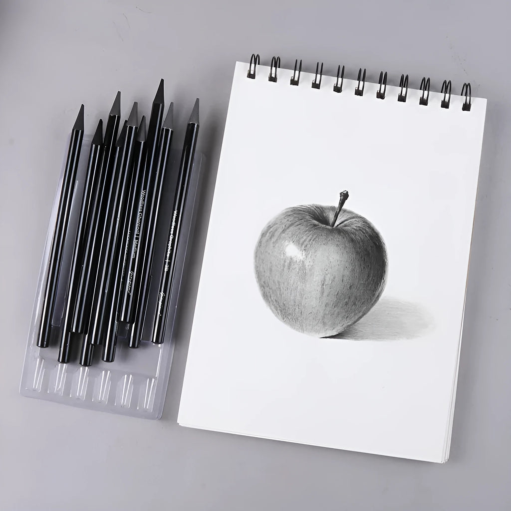 Carbonized Pencil Suit set showing 6 graphite and 3 carbonized pencils on suction card packaging.