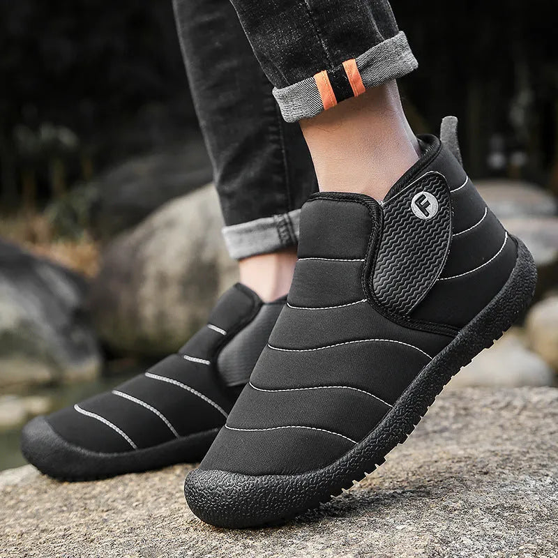 Unisex waterproof cotton snow boots with non-slip soles in black, blue, green, and yellow.