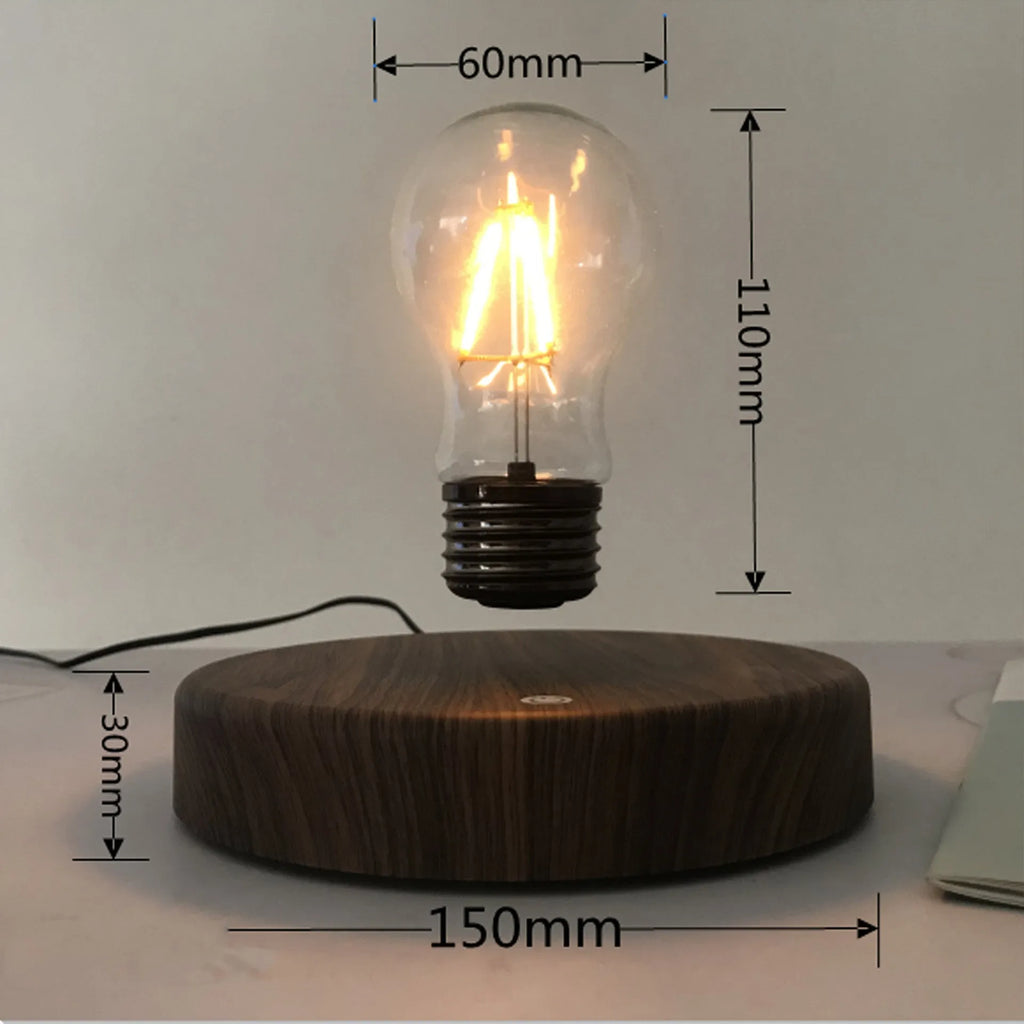 Magnetic levitation bulb night light floating above wooden base