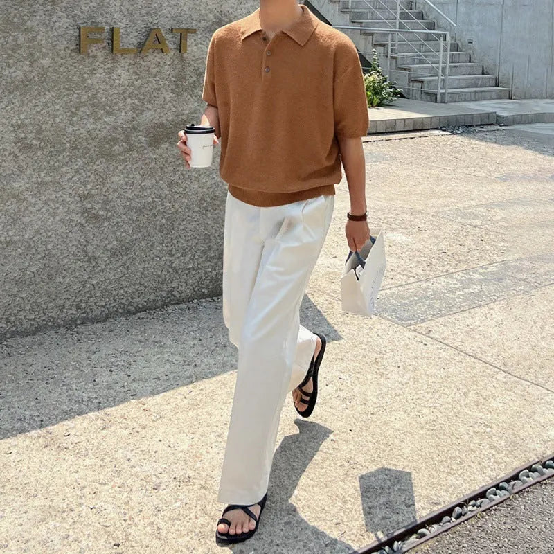 A caramel-colour men's retro knitted polo shirt with short sleeves and an asymmetric design detail on the front.
