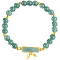 Women's silver bracelet with blue jade beads on a white background.