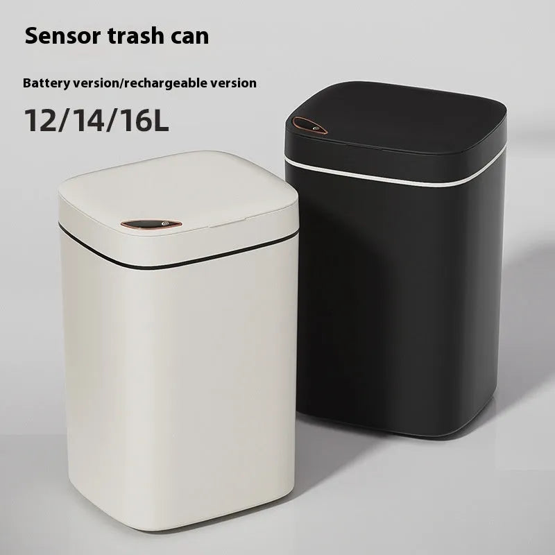 Automatic sensor bin with square white body and open induction lid on a kitchen floor.