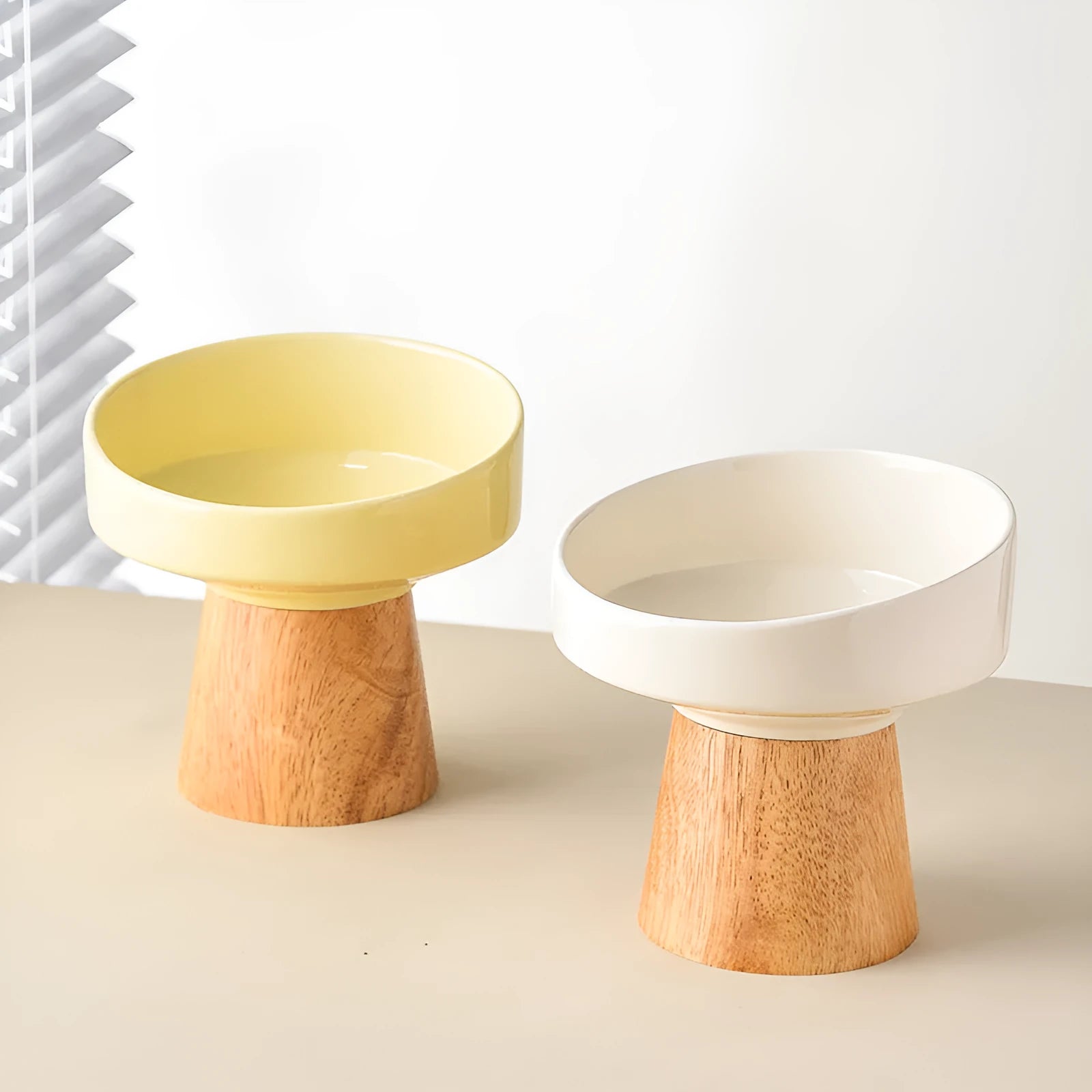 Set of four ceramic pet feeding bowls in beige green khaki and yellow colours for cats and small dogs