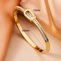 Gold plated titanium steel bangle bracelet with gang drill style, available in gold and steel colours.
