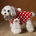 Red polka dot sleeveless hooded dog vest coat on a pet, front view, polyester fabric