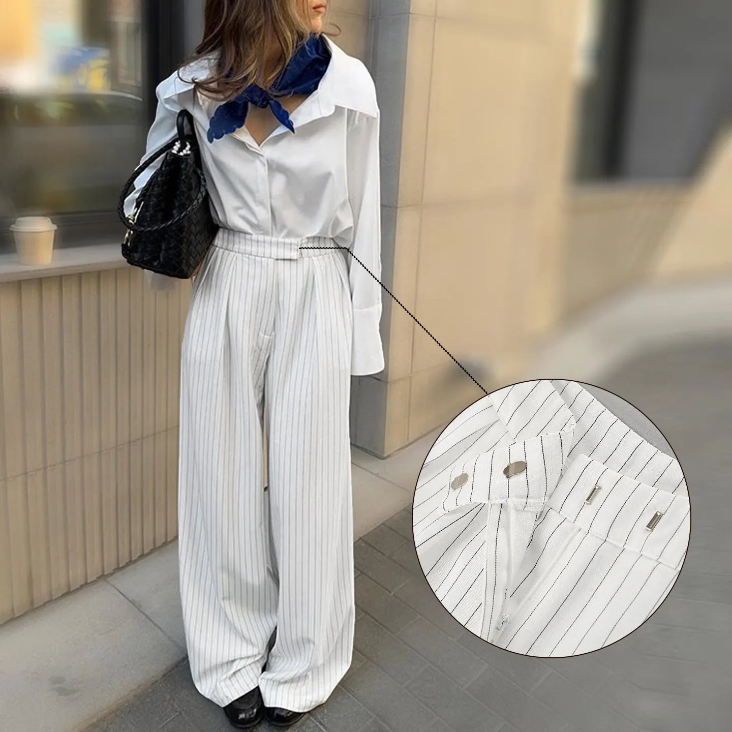 White striped wide-leg trousers with zipper detailing on loose casual silhouette
