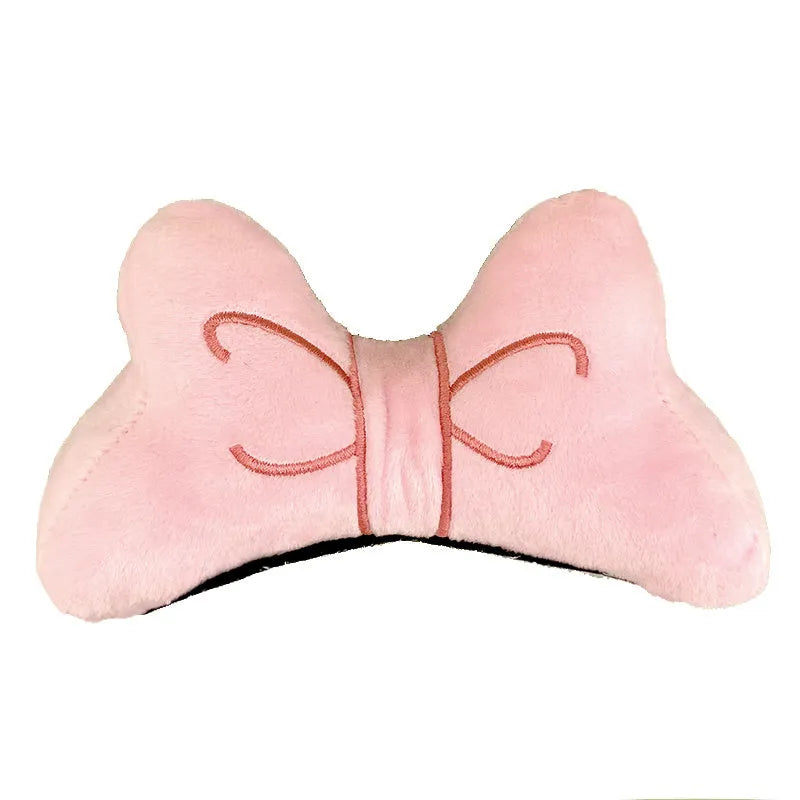 Soft plush bow decoration for helmets in red, peach pink, and rose pink colour options.
