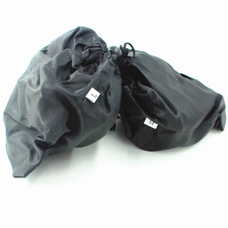 Reinforced non-slip crampons for shoes in black colour with large teeth, shown on a snowy surface