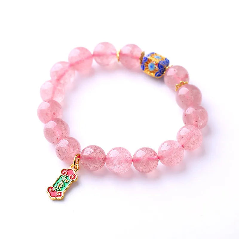Pink strawberry quartz crystal bracelet with hand-woven Ruyi symbols and text elements
