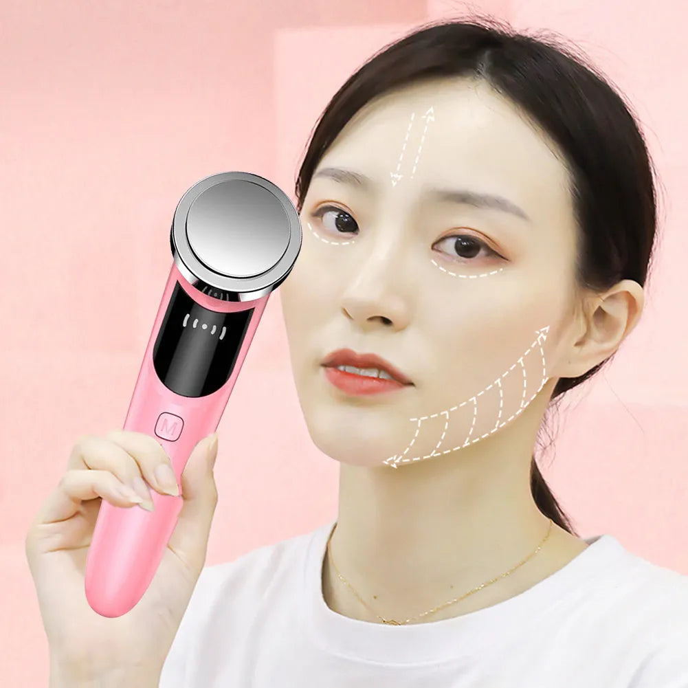 Warm skin rejuvenation facial vibration massager with IPL function, BY-009 model, on a surface
