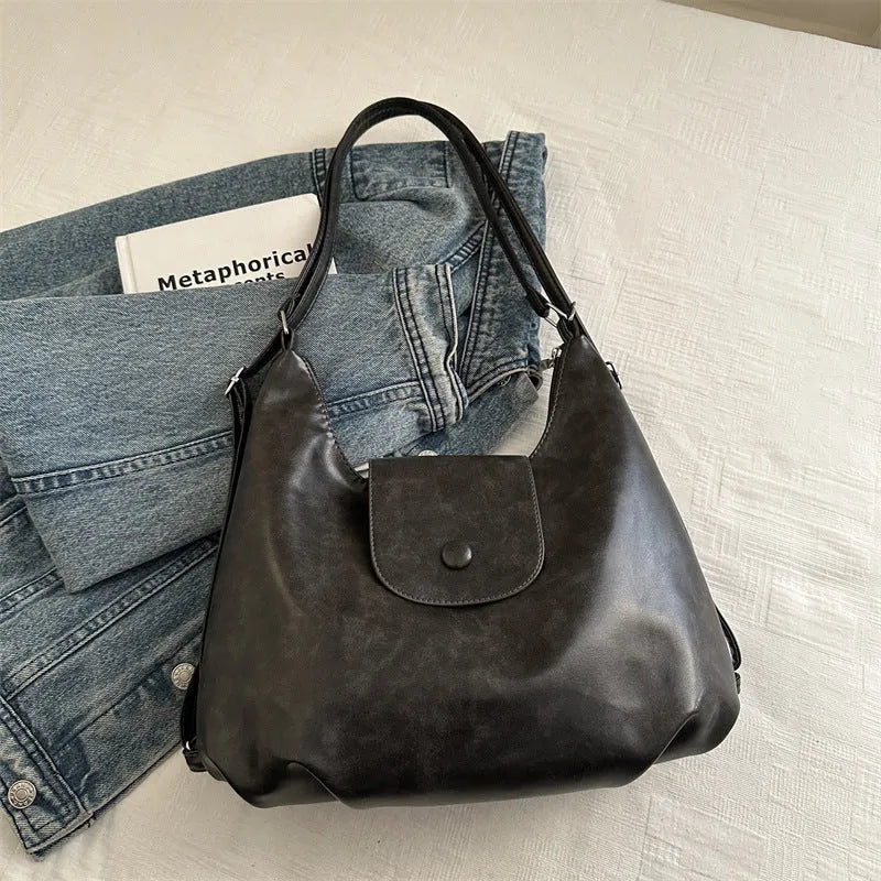 Women's horizontal square PU leather shoulder bag in urban simplicity style with single strap and internal phone pocket