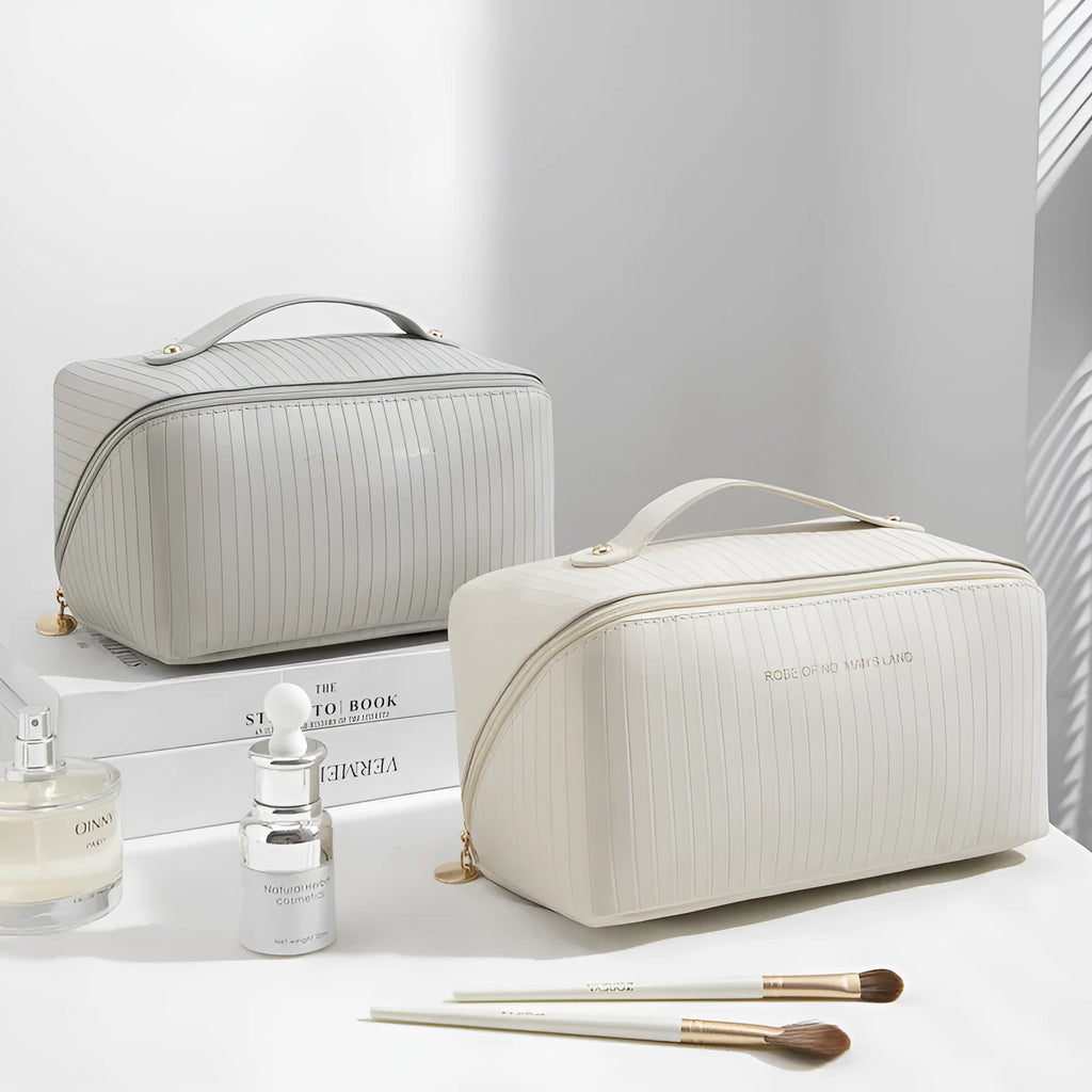 Vertical pattern cubic PU makeup bag in beige, showing large capacity for travel storage.