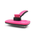 Rose red pet grooming comb with stainless steel teeth on white background