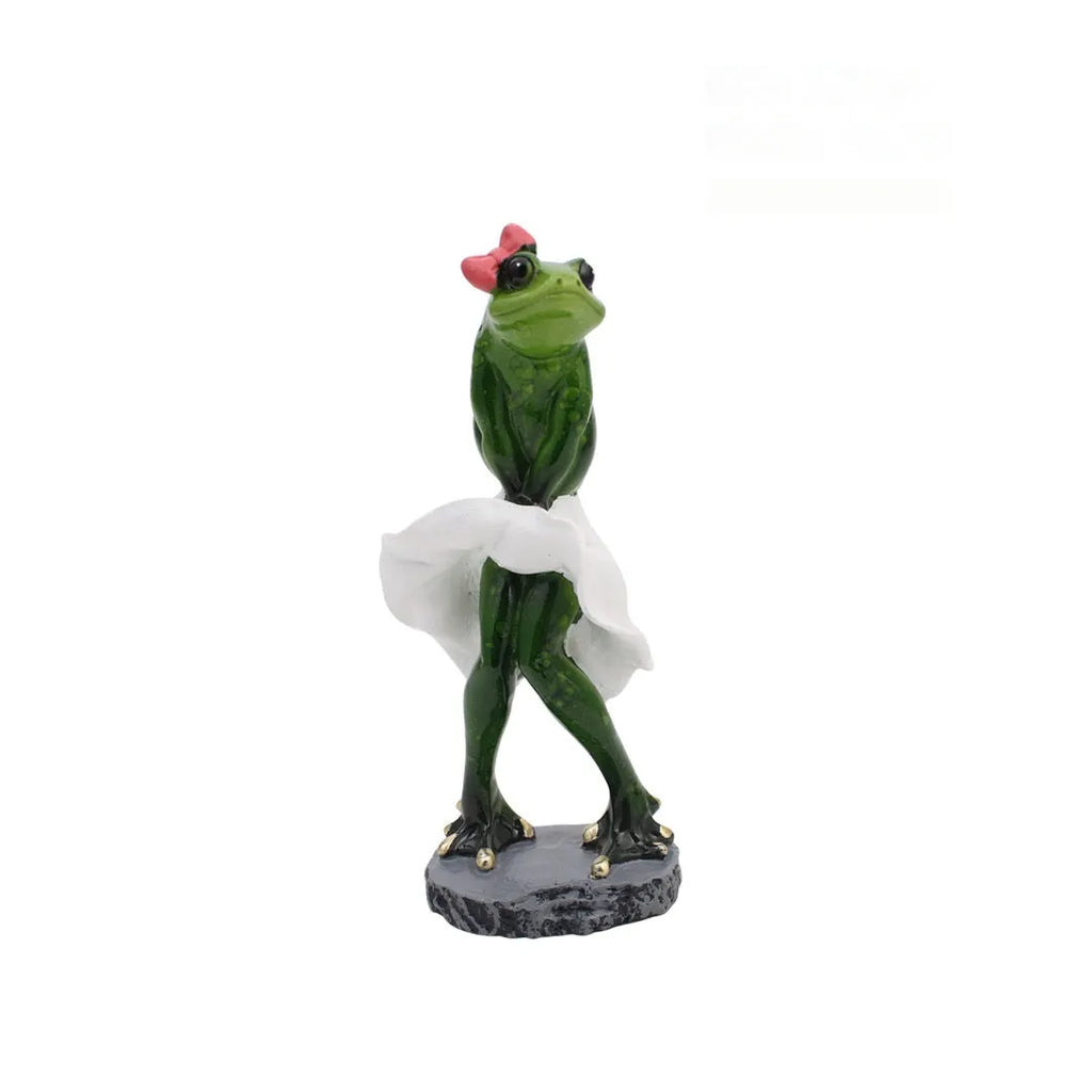 Pastoral style synthetic resin frog ornament with plastic base for shelf or desk decoration.