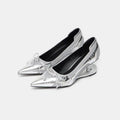 Black women's pointed toe Mary Jane shoes with a unique floating shaped heel and slip-on design.