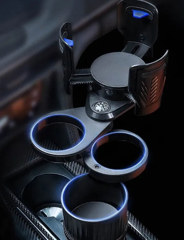 Black carbon fibre car cup holder with a retractable base on a car centre console.
