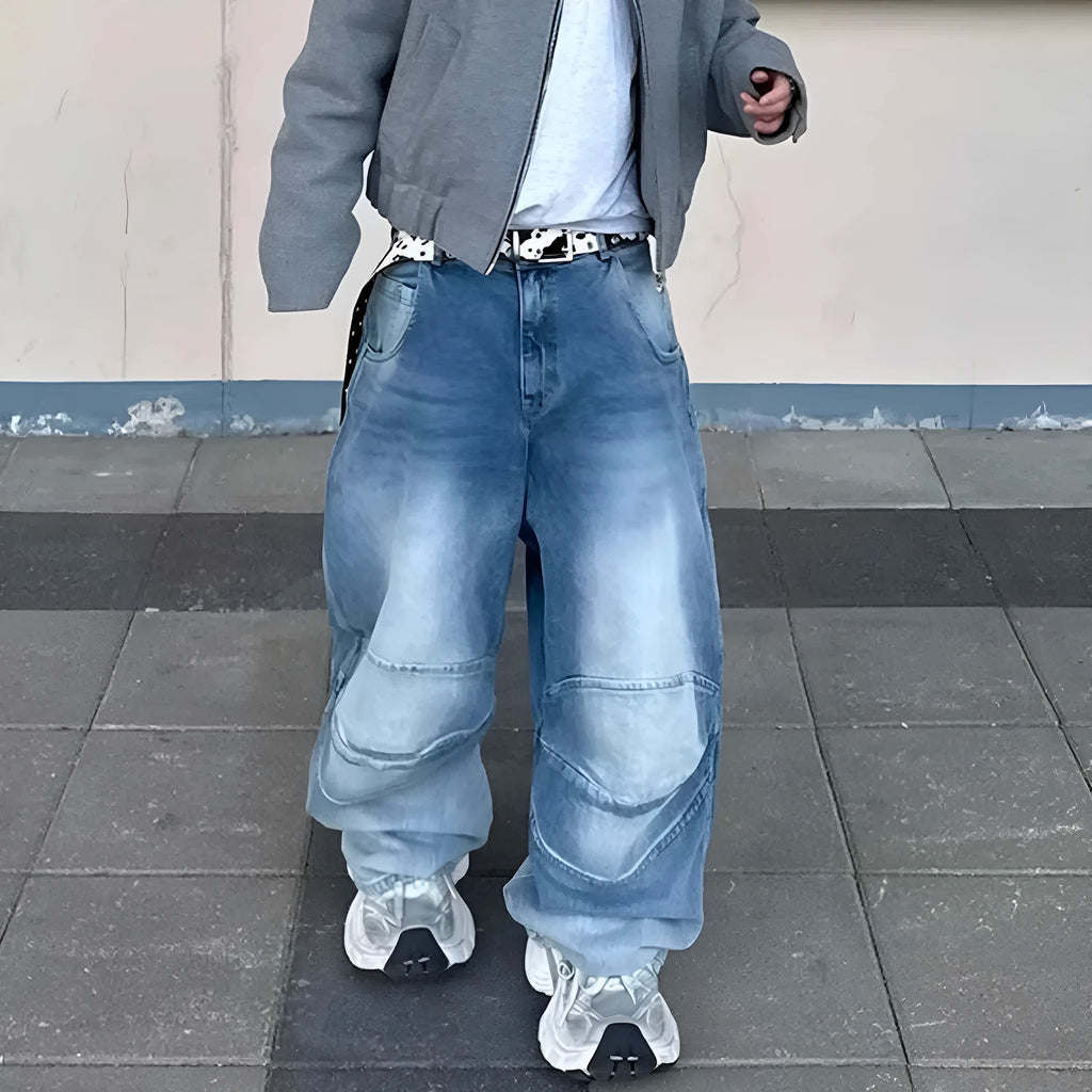 Men's washed light blue baggy jeans with a straight-leg cut and zip fly.