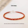 Women's Southern Red agate bracelet with 3mm cut surface in cherry red on a wrist.
