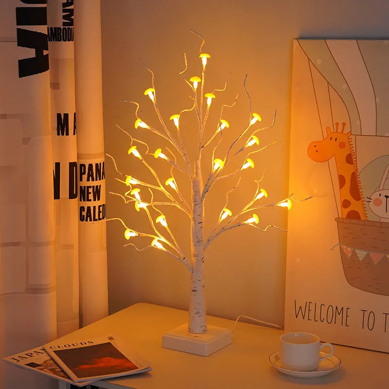 60cm tall white birch tree LED lamp with small red detachable mushroom flowers on a table.
