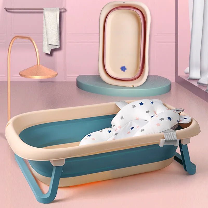 Foldable baby bath support mat with styrofoam cushion in white star pattern, placed in a bathtub