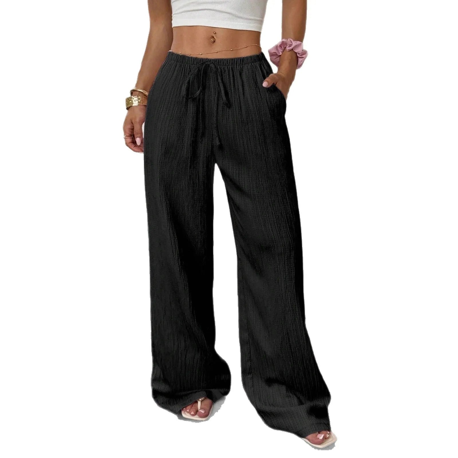 Women's black wide-leg trousers with a front lace-up waist detail on a mid-rise waistband.