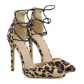 Women's brown suede cross strap pointed toe high heel sandals with 12cm slim heel on a light background