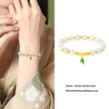 Sterling silver bracelet with natural Hetian jade bamboo leaf beads in zhizhu colour