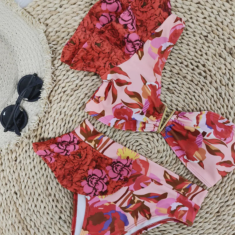 Women's one-shoulder pink floral high-waist bikini swimsuit with ruffled detailing