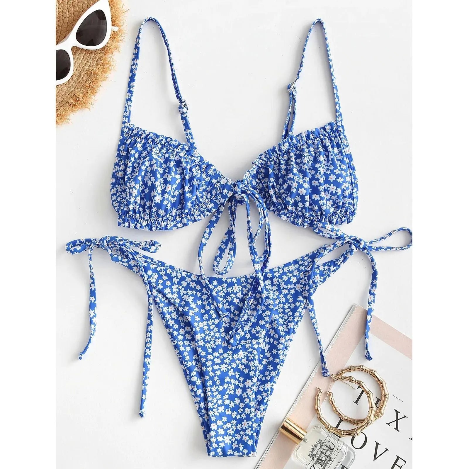 Blue printed women's swimsuit with multi-rope banded detailing and lapel collar
