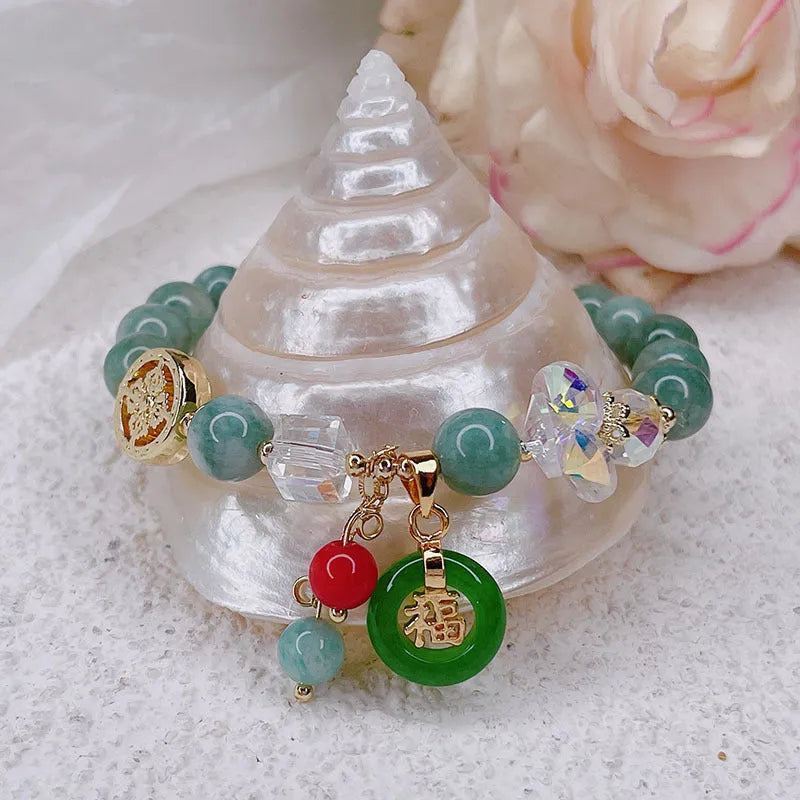 Retro Jinsi Jade bracelet with blessing card and fu character on display