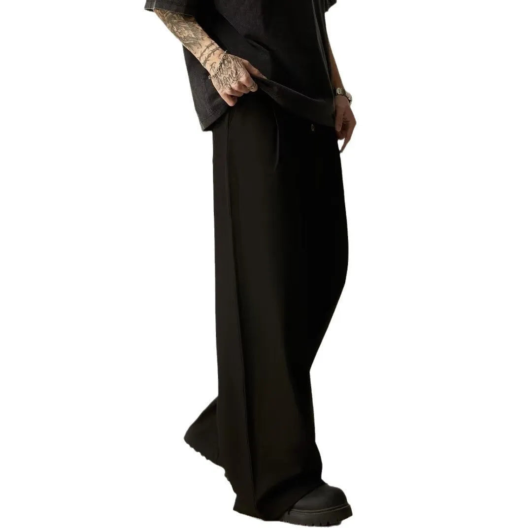 Men's black solid colour wide-leg casual trousers with a straight-leg cut and button fly.