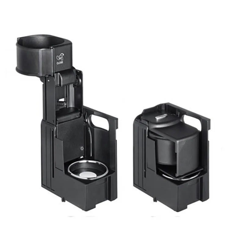 Black plastic Mercedes-Benz water cup holder bracket with part number 2116800014