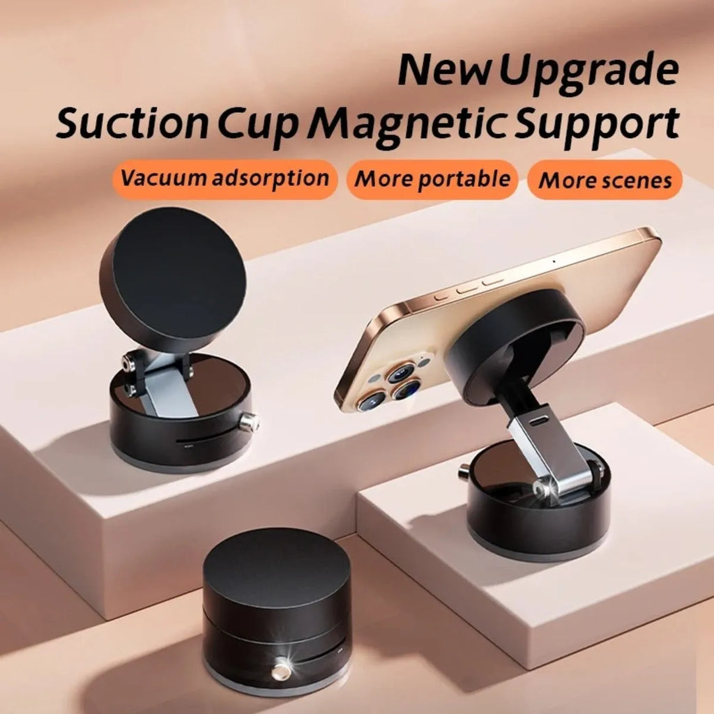 Black magnetic car phone mount with vacuum suction cup and 360-degree rotation ball joint on dashboard