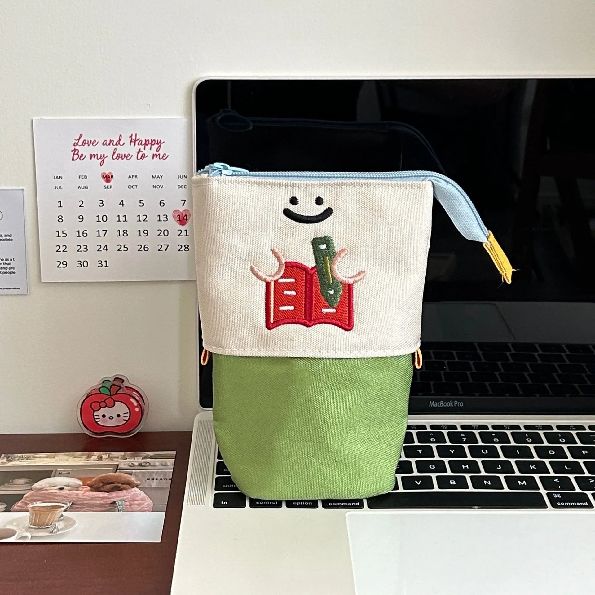 Brown Korean-style cartoon collapsible pencil case made from Oxford cloth, shown open and closed.