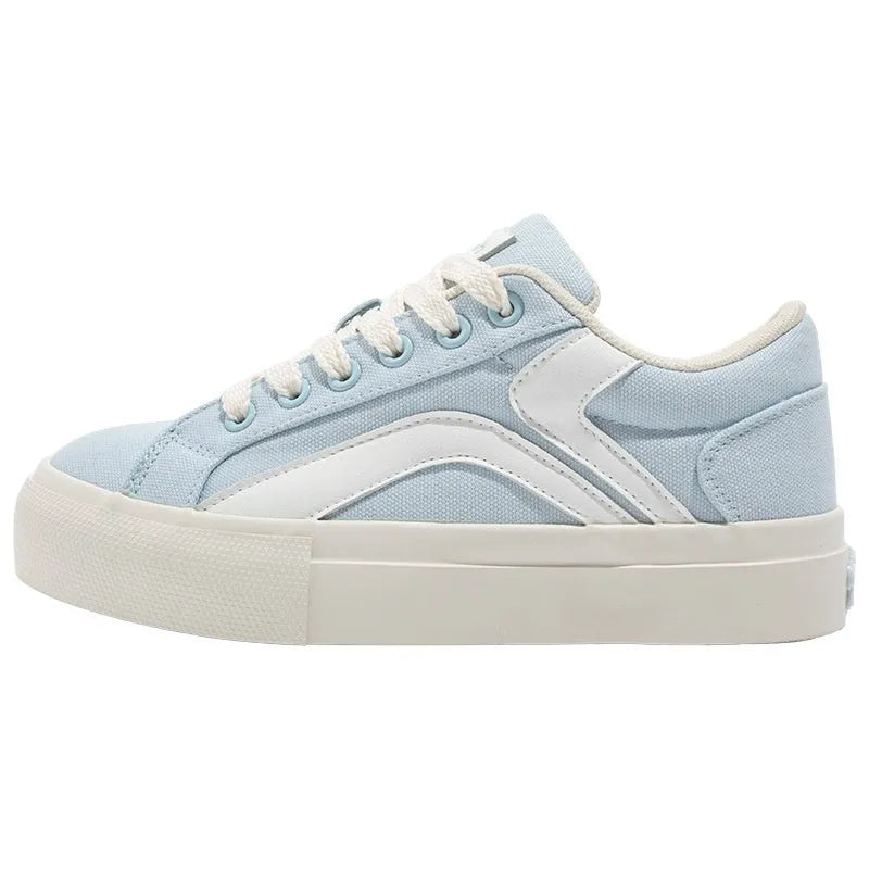 Women's low-top lace-up board shoes in synthetic leather with a vulcanised rubber sole, shown in a two-tone colour option.
