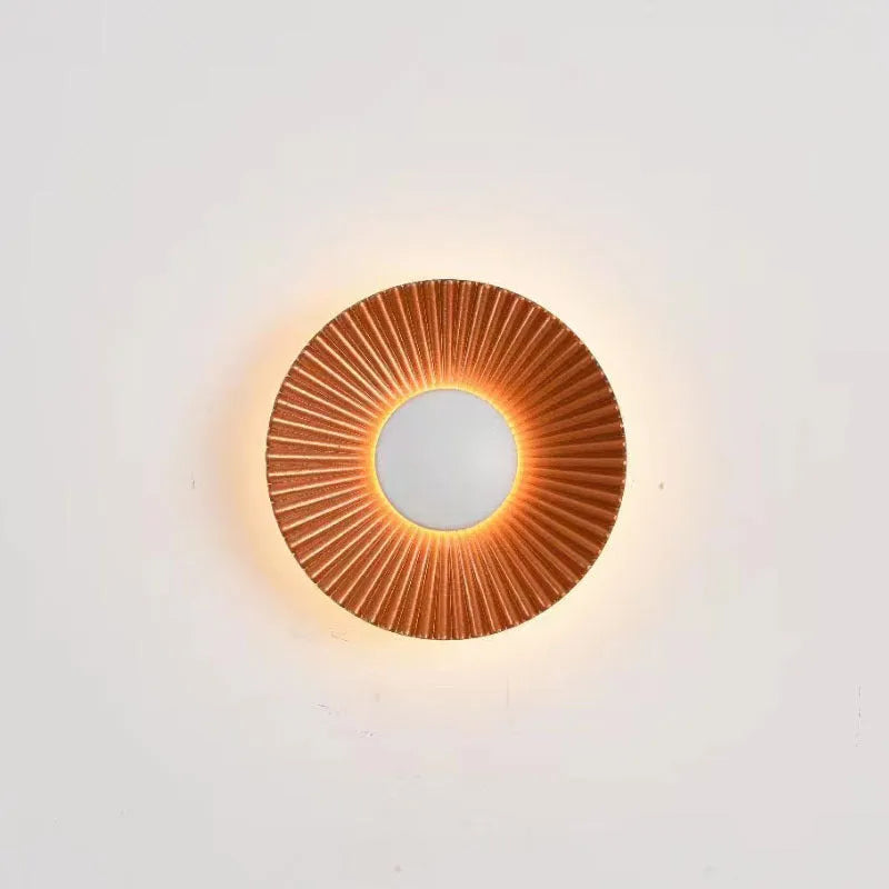 Round aluminium wall lamp with LED light in a choice of six colour finishes.