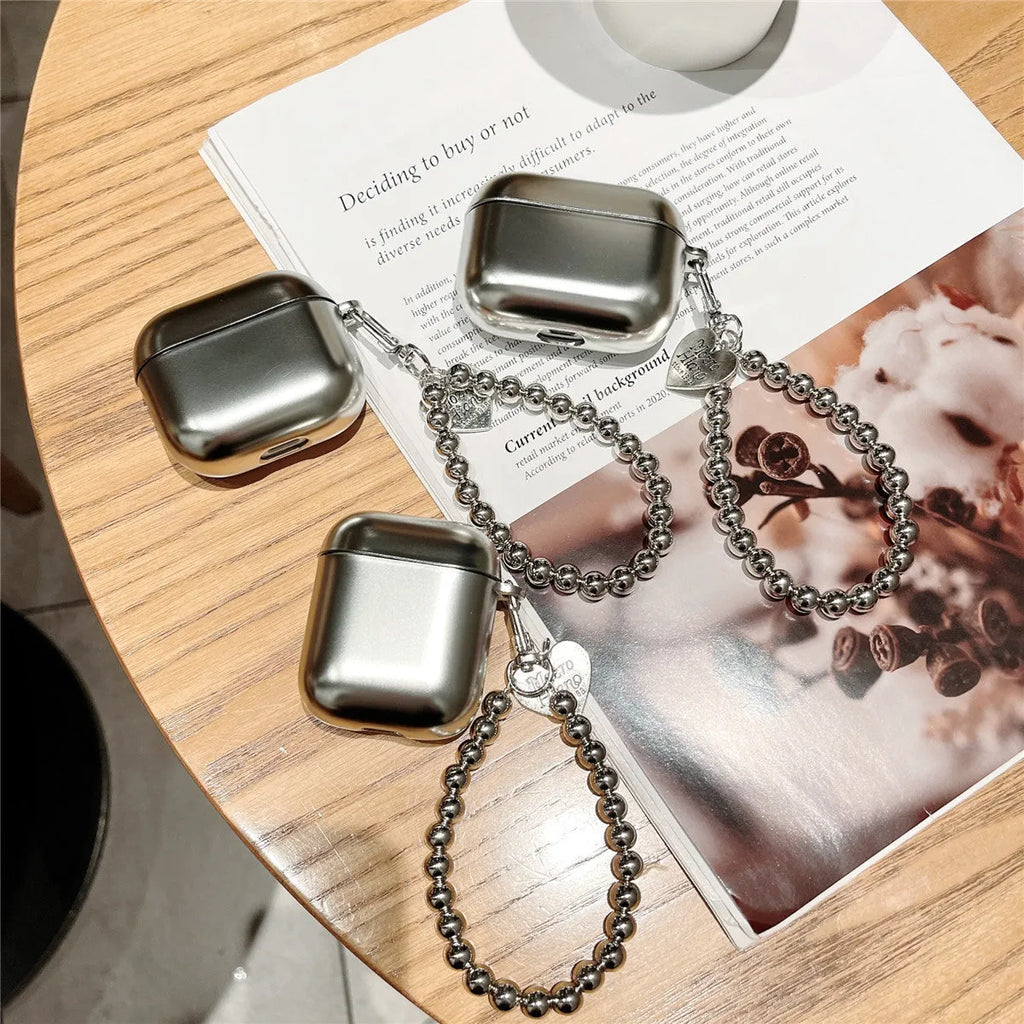 Matte plating TPU protective case for AirPods with an attached bracelet strap.