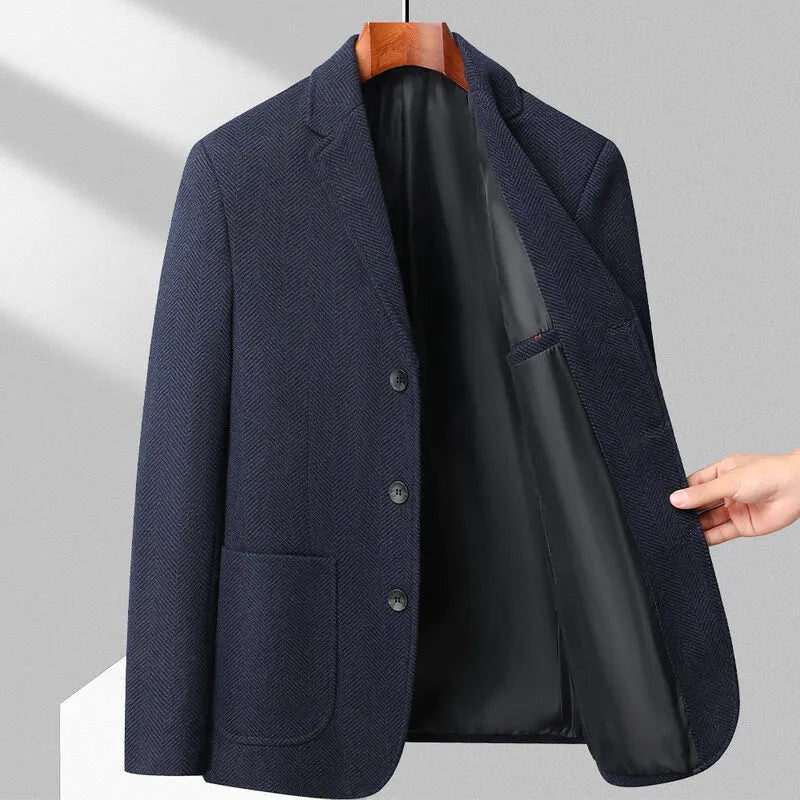 Men's loose-fit woolen suit coat in a solid colour, shown for casual spring or autumn wear.