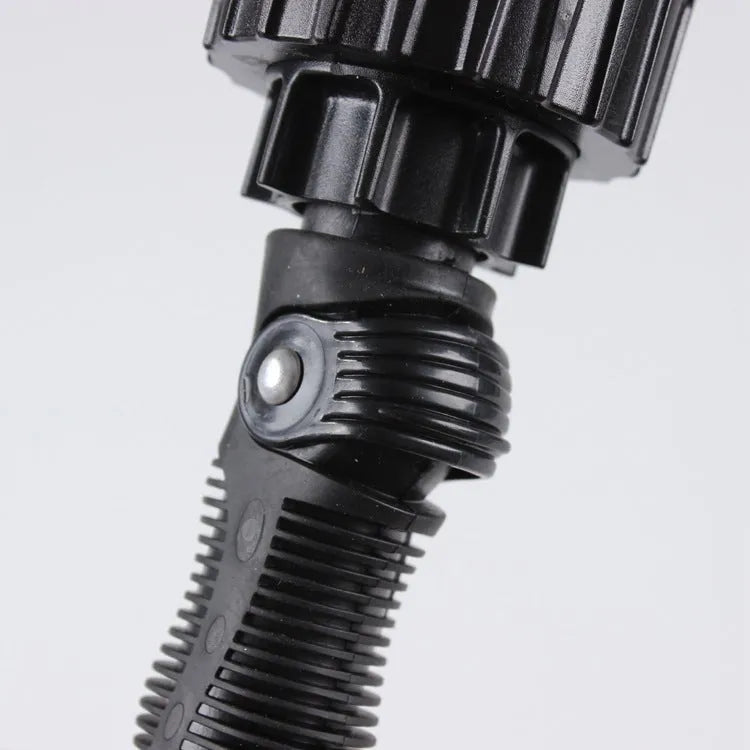 Black water-powered wheel brush 38cm long with soft and rigid brush heads connected to garden hose for tyre cleaning