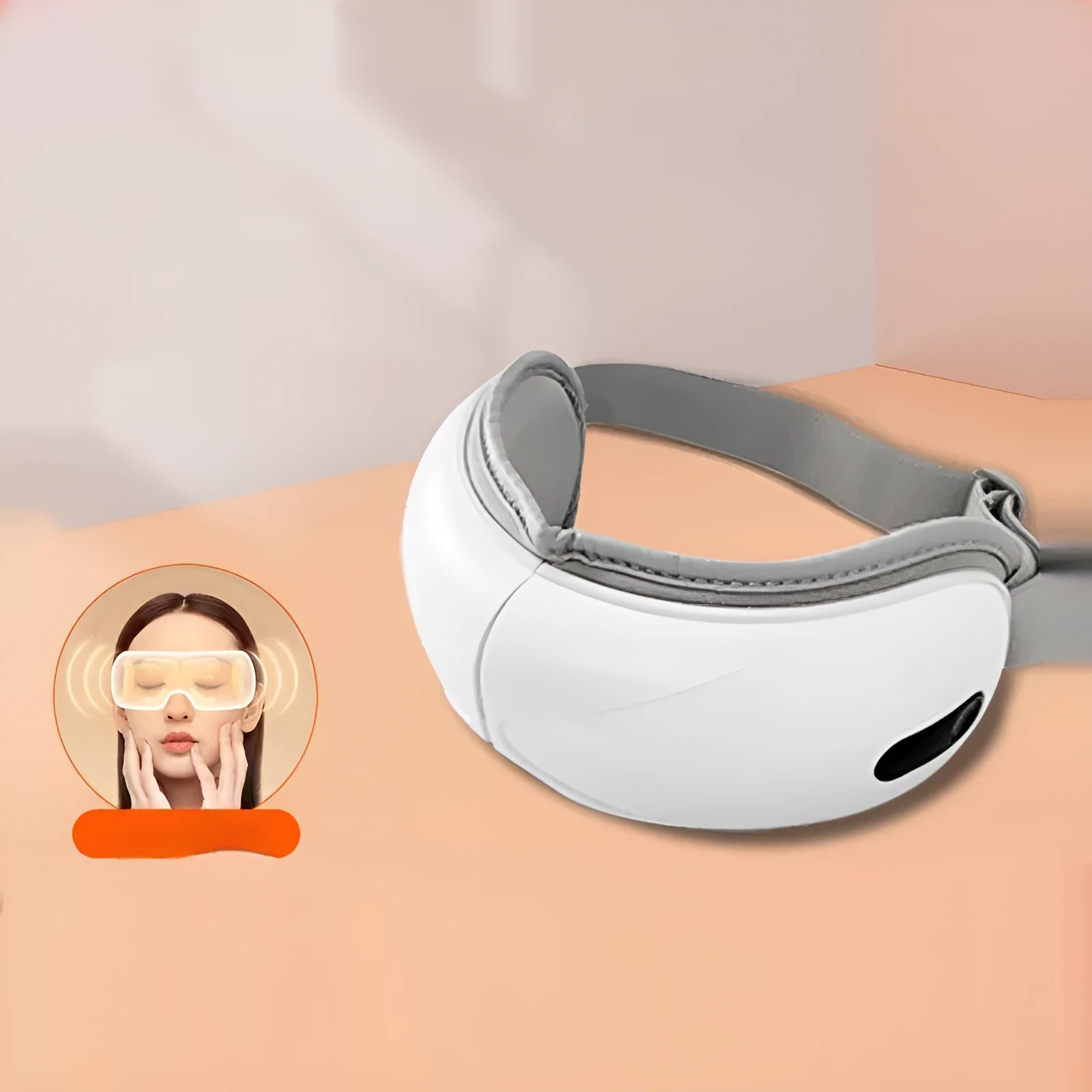 White rechargeable airbag eye massager with heat compression on a plain background