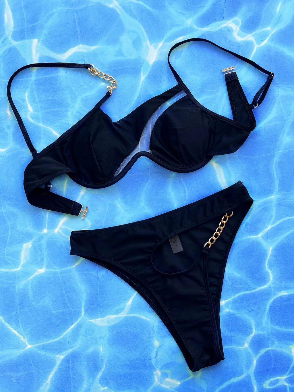 Black women's hollow split two-piece swimsuit with nylon fabric for swimming