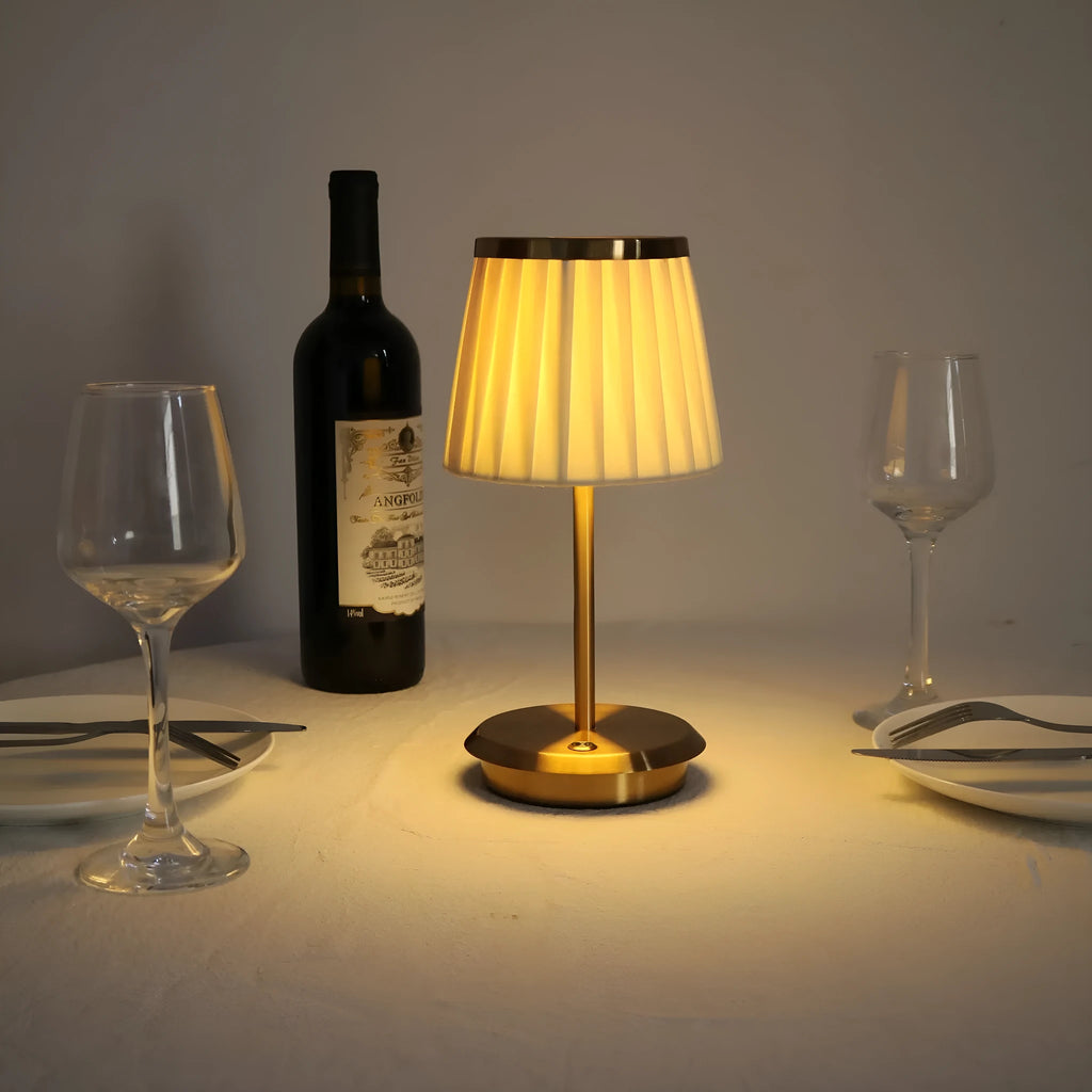 Gold alloy desk lamp with 3W LED light head and Type-C charging port on a wooden desk