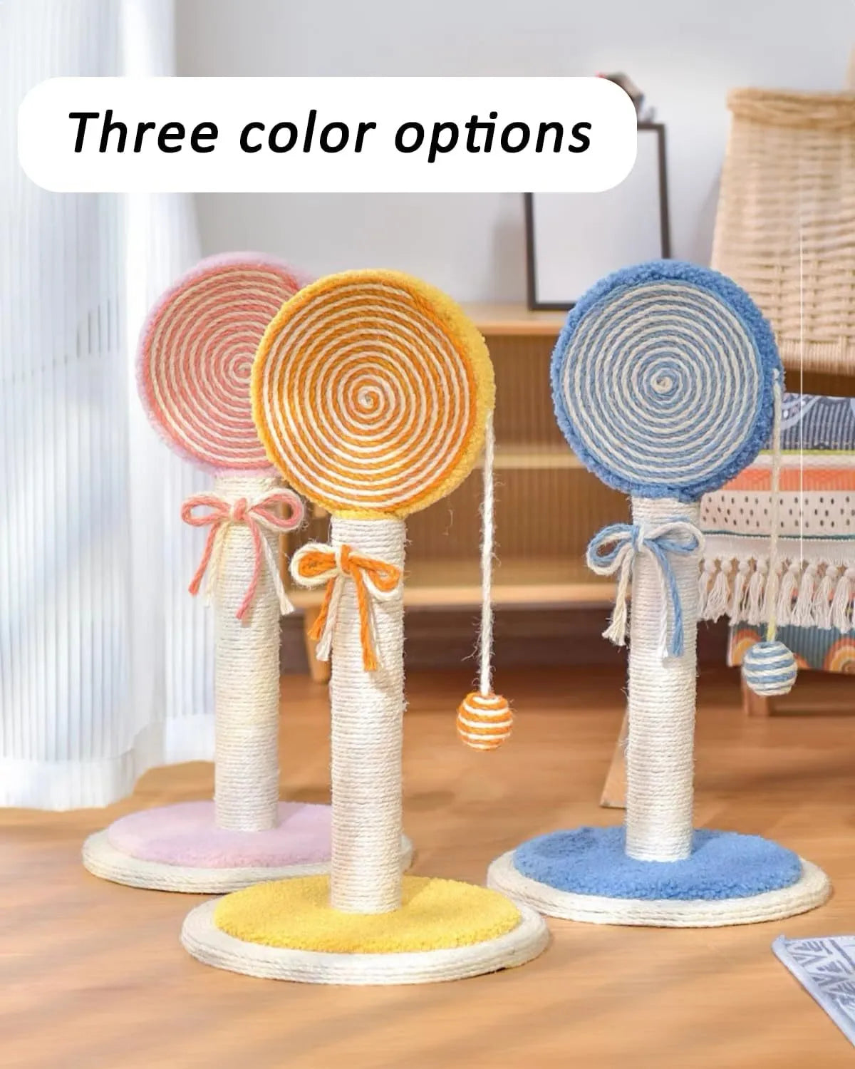 Blue cat scratching post with natural sisal rope and a hanging yellow ball on a sturdy wooden base.
