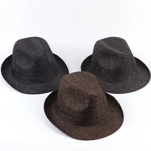 A classic brown fedora hat for men on a wooden stand, showing its structured crown and medium-width brim.