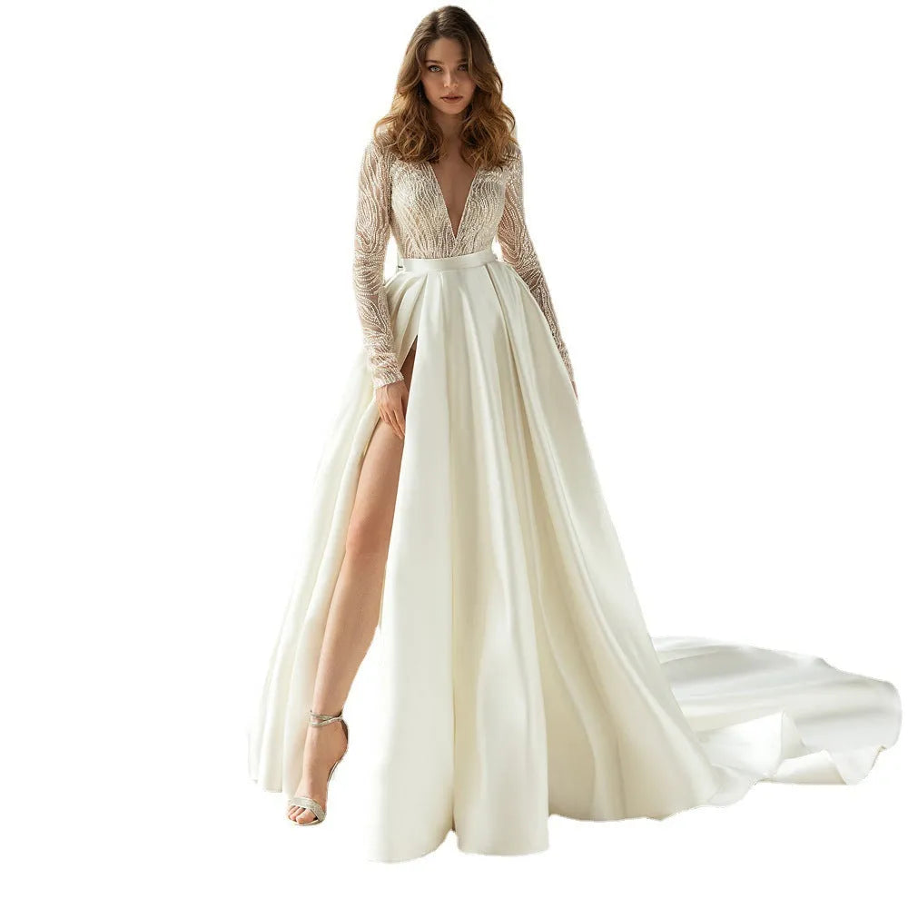 Women's long white polyester dress with gilded hollow-out detail, long sleeves, and full-length skirt