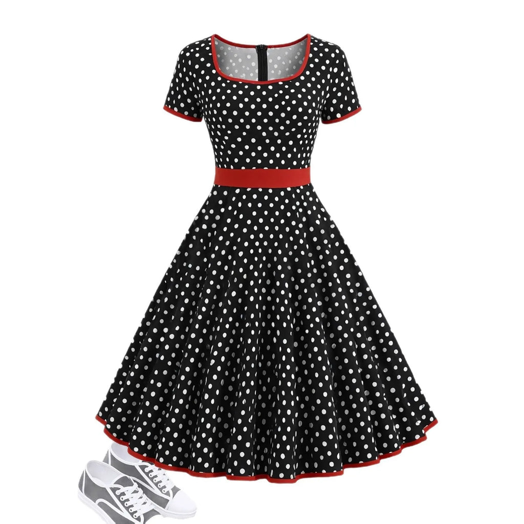 Multicolour polka dot dress with square neckline, short sleeves, front zip, and a pleated midi skirt.